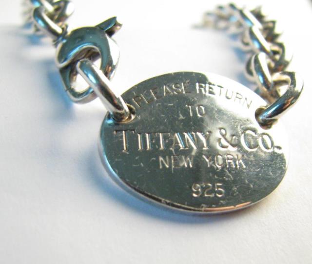 Appraisal: A sterling silver Tiffany Co Please Return to Tiffany Co