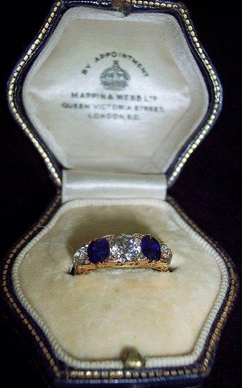 Appraisal: A five-stone diamond and sapphire ring the alternate set stones