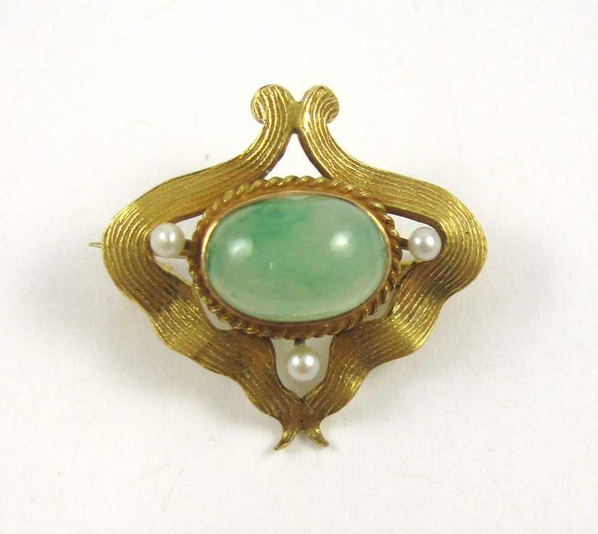 Appraisal: JADE SEED PEARL AND FOURTEEN KARAT GOLD Pin The yellow