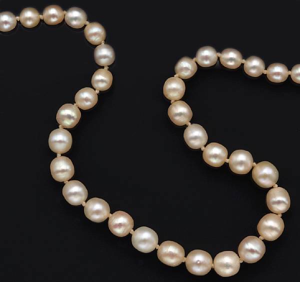 Appraisal: A natural pearl necklace comprising eighty-five pearls measuring approximately to