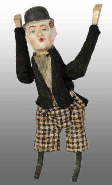 Appraisal: Charlie Chaplin Wind-Up Tumbling Toy Description American Circa Probably made