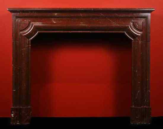 Appraisal: A French Louis XIV Style Rouge Griot Marble Fireplace Surround