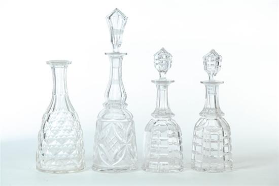 Appraisal: FOUR GLASS DECANTERS Probably American mid th century Pair in