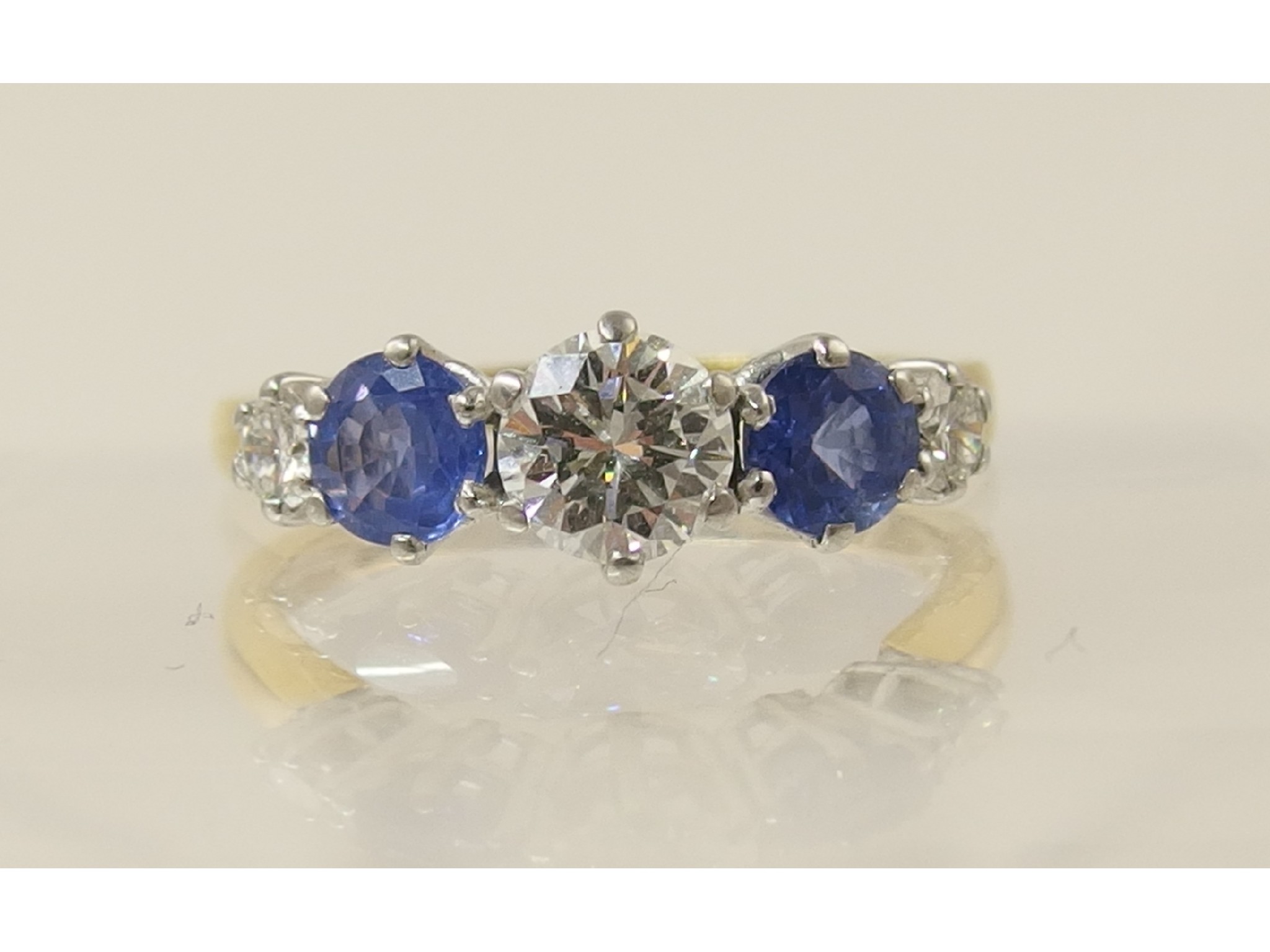 Appraisal: An ct cornflower blue sapphire and diamond ring diamond total