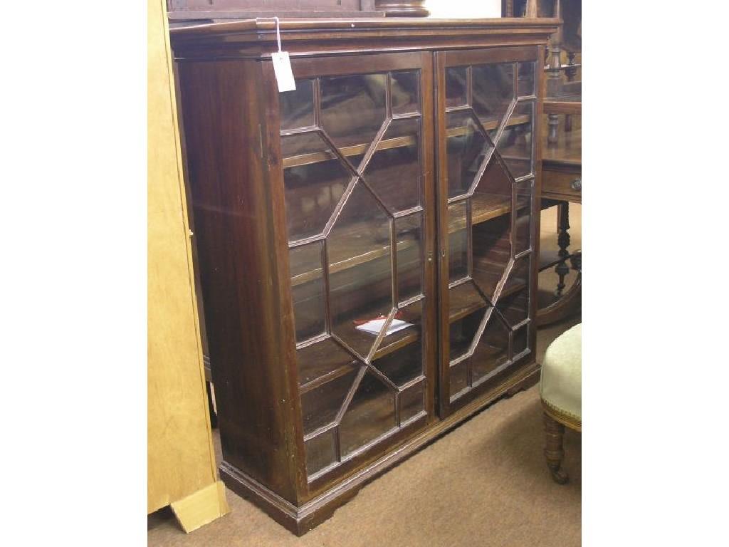 Appraisal: A George III mahogany bookcase modified pair of astragal-glazed doors