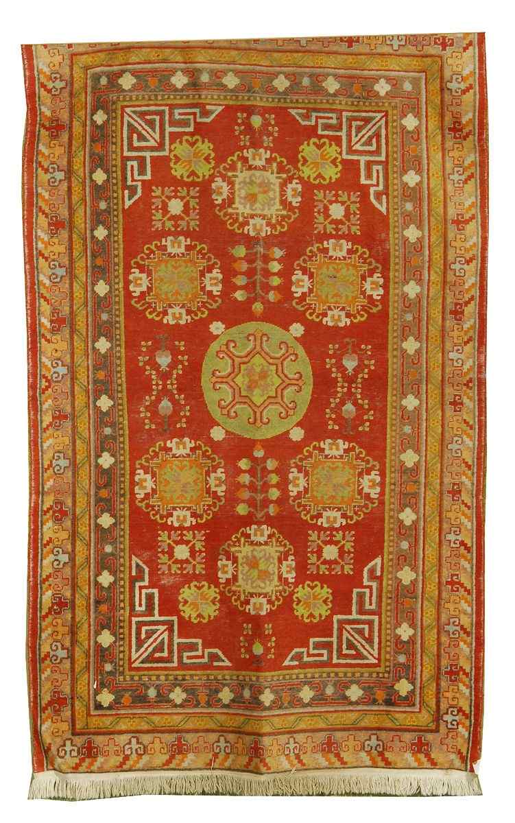 Appraisal: ORIENTAL RUG KHOTAN ' x ' '' Bold medallions composed