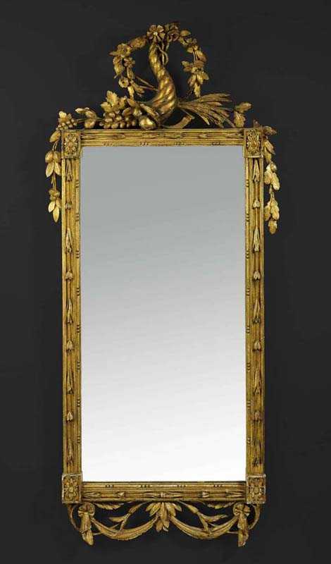 Appraisal: PIERCED AND CARVED GILTWOOD MIRROR A LA CORNE D'ABONDANCE Louis