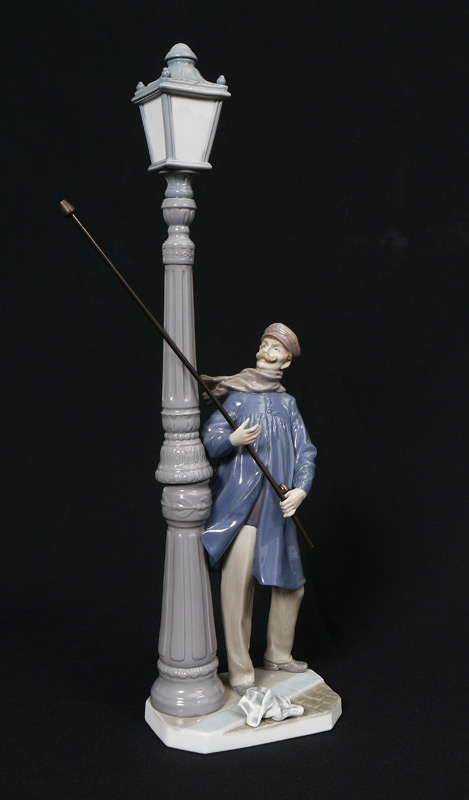 Appraisal: LLADRO PORCELAIN FIGURINE Lamplighter Salvador Furio sculptor issued ''h x