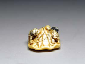 Appraisal: ANTIQUE IVORY NETSUKE Very finely detailed and antique carved ivory