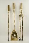 Appraisal: FIREPLACE SET - th c three piece cast brass fireplace