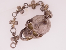 Appraisal: Skull watch with skull links on chain c open jaw