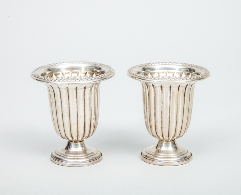 Appraisal: PAIR OF LEONARD SILVER-WEIGHTED CIGARETTE URNS IN THE 'LA PIERRE'