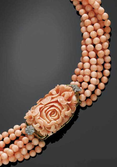 Appraisal: CORAL AND DIAMOND NECKLACE TORSADE Yellow gold Elegant seven-row necklace