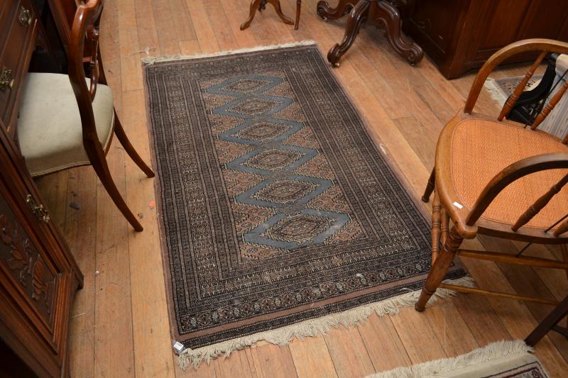 Appraisal: A SMALL BLUE AND GREY RUG WITH PERSIAN DESIGN A