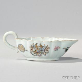 Appraisal: Armorial Export Porcelain Sauceboat China c with scalloped gilt edge