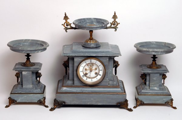 Appraisal: French marble mantle clock with garniture Clock with porcelain dial