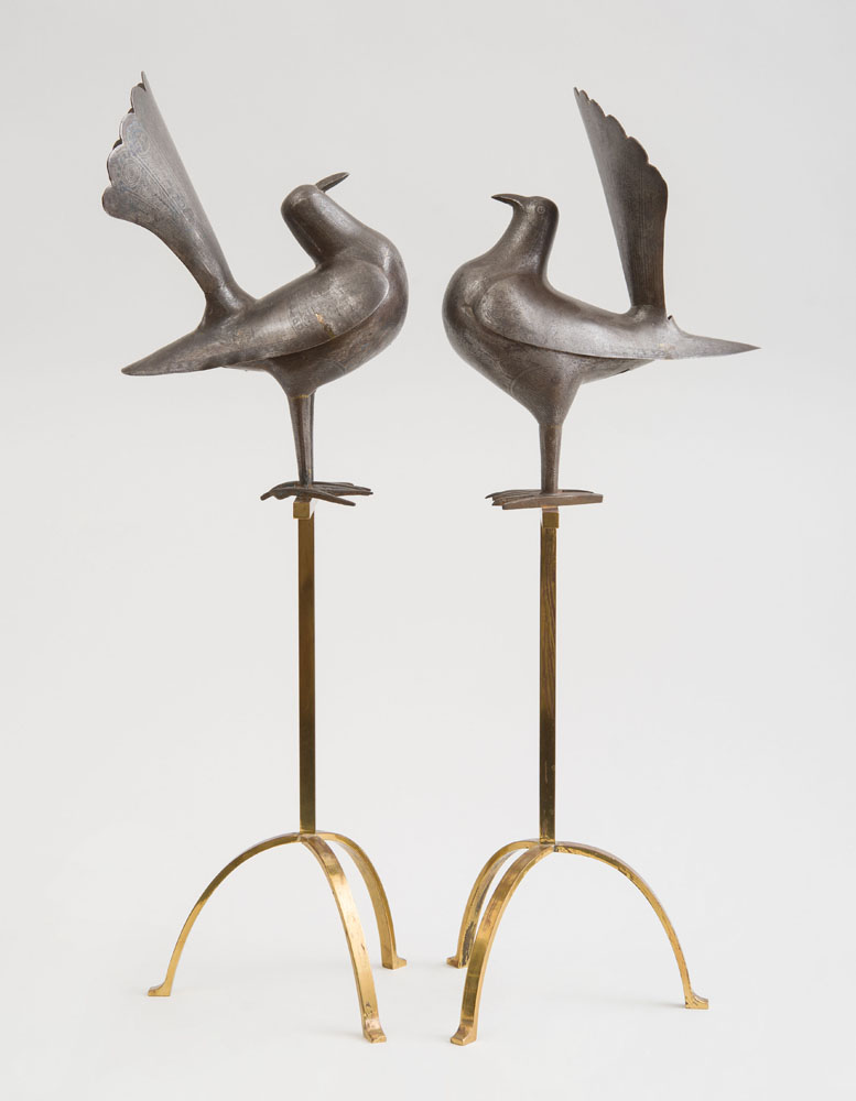 Appraisal: PAIR OF PERSIAN DAMASCENED STEEL PIGEONS QAJAR Raised on later