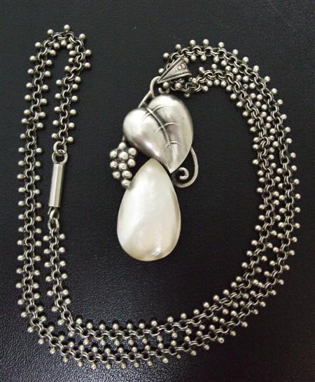 Appraisal: AUSTRIAN SCHOOL PENDANT CIRCA white metal and mother of pearl