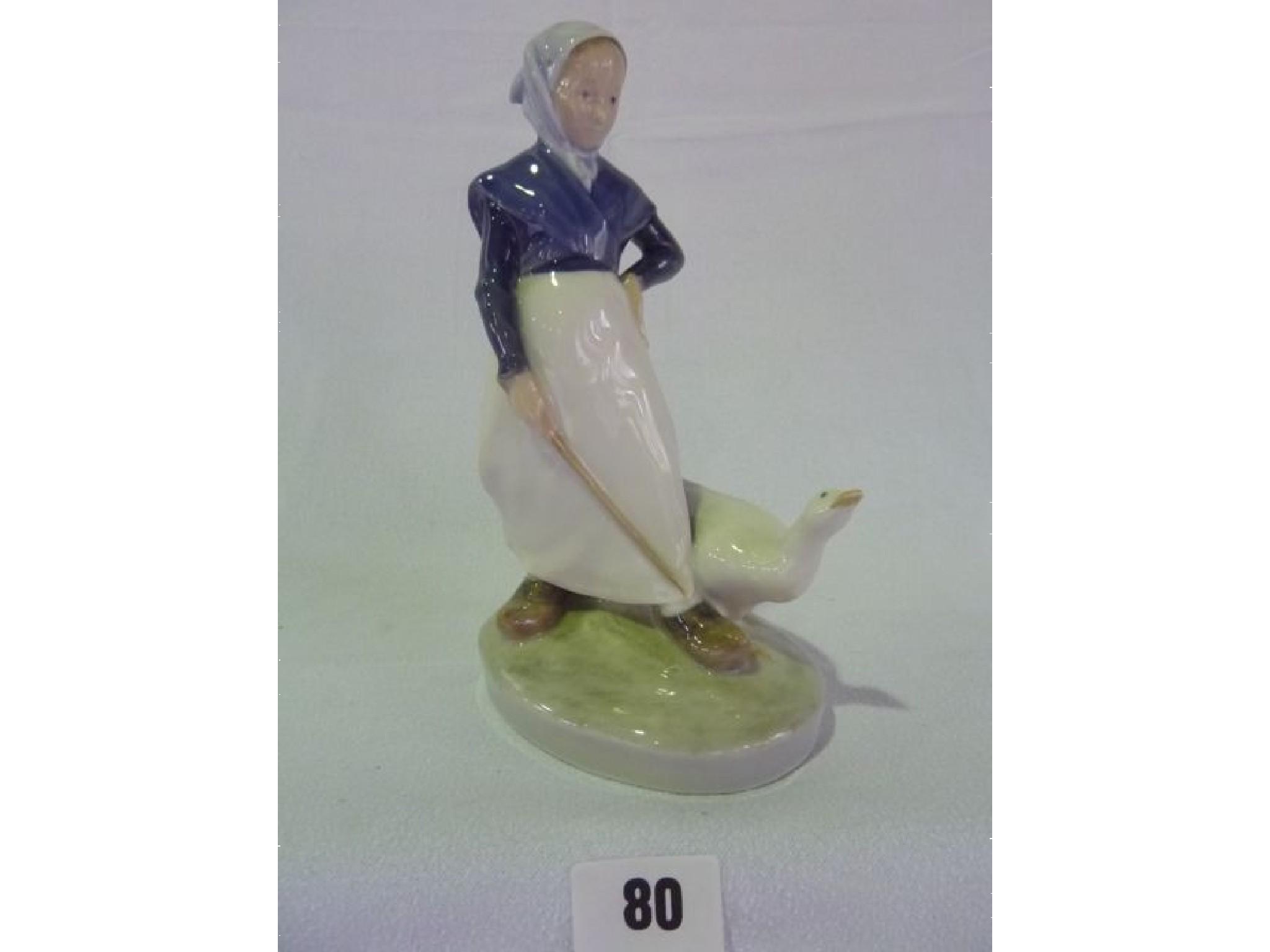 Appraisal: A Royal Copenhagen figure of a lady with goose