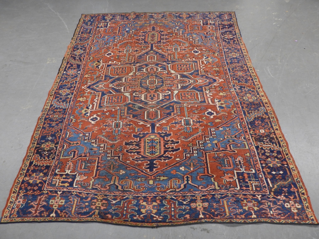 Appraisal: ROOM SIZE HERIZ RUG Middle East th CenturyRed blue navy