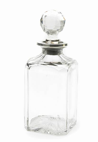 Appraisal: A George V cut glass liquor decanter with silver locking