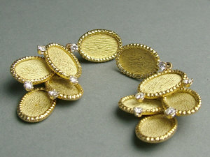 Appraisal: A pair of ct gold and diamond pendant earrings Each