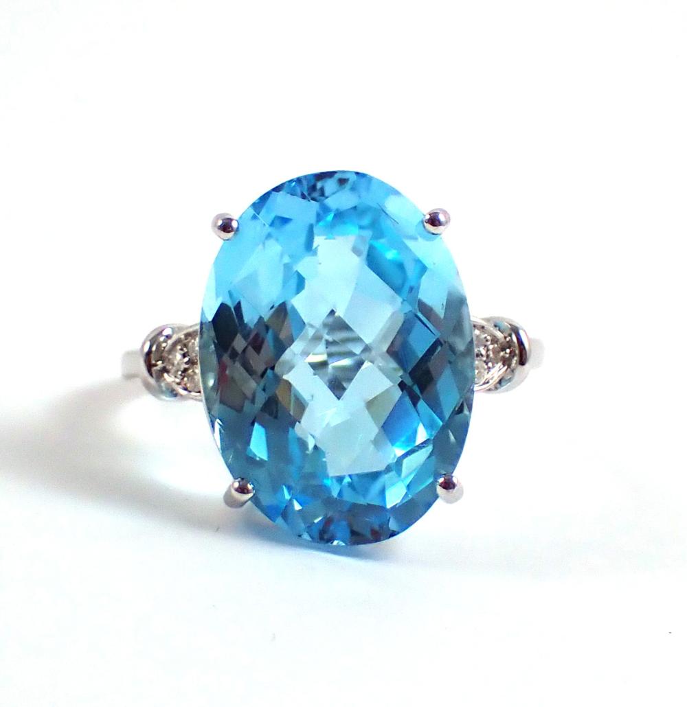 Appraisal: BLUE TOPAZ DIAMOND AND FOURTEEN KARAT WHITE GOLD RING with