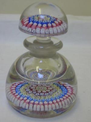 Appraisal: A STOURBRIDGE GLASS INKWELL of circular form the domed stopper