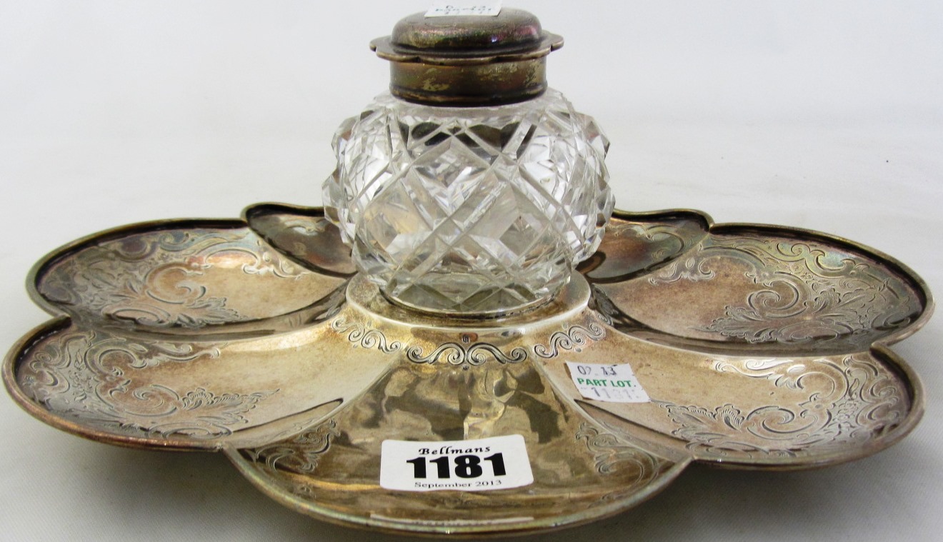 Appraisal: A Victorian silver inkstand of scalloped form with engraved decoration