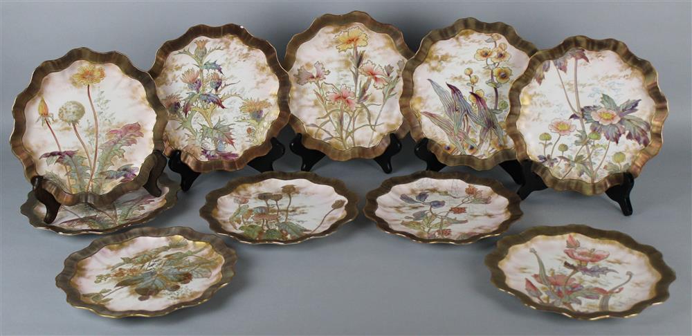 Appraisal: TEN DOULTON BURSLEM DESSERT PLATES decorated with stylized flowerheads and