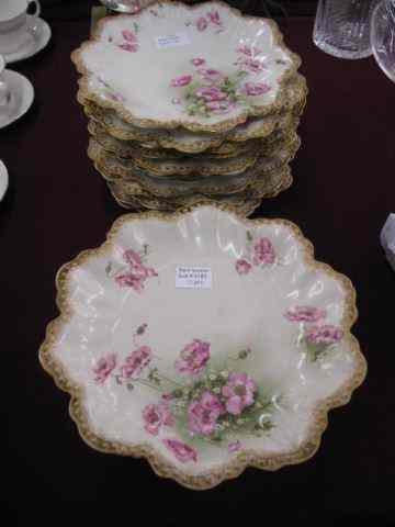 Appraisal: Limoges Porcelain Dessert Service for floral decor on scallop design