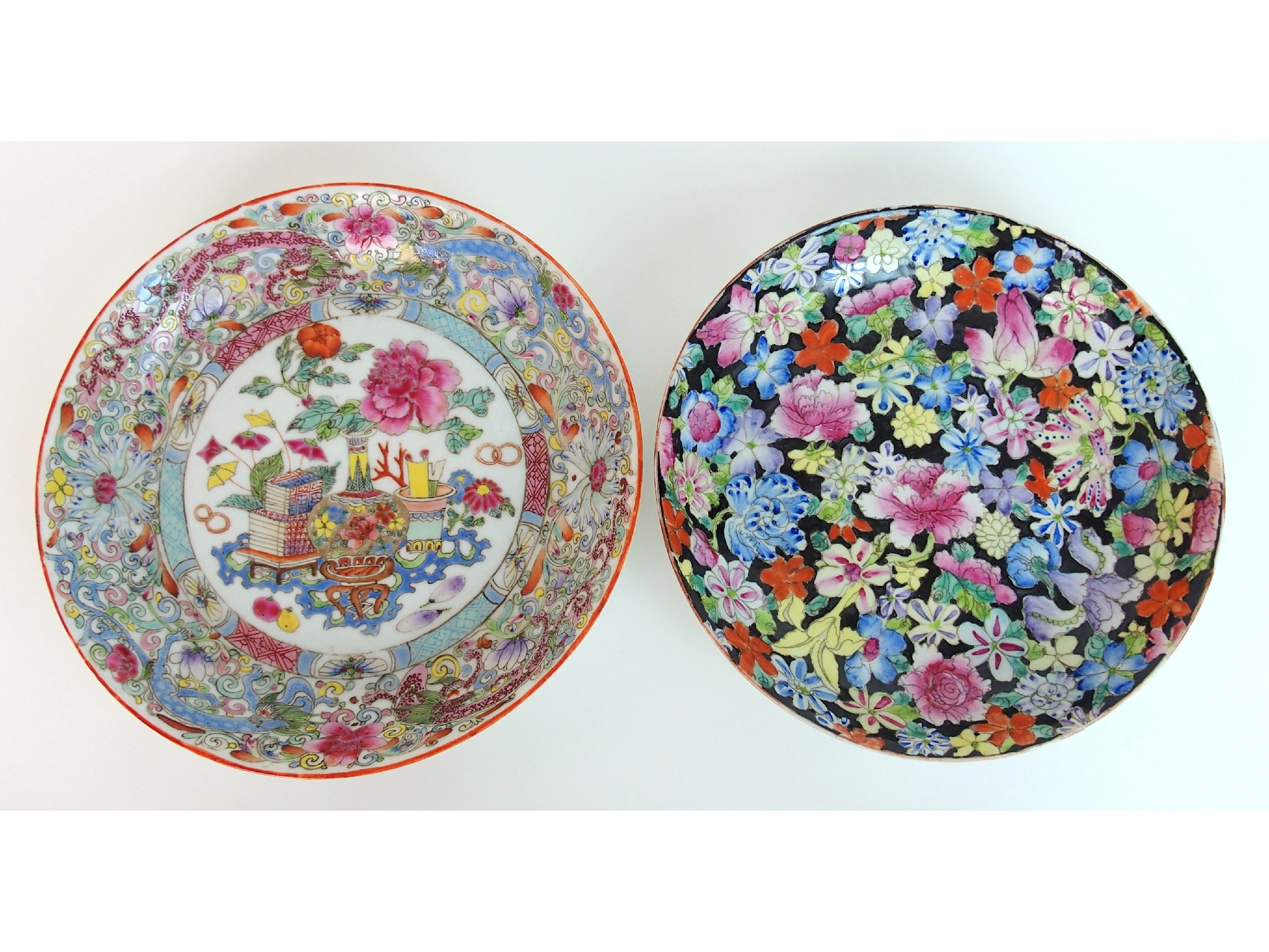 Appraisal: A Canton famille rose saucer dishpainted with precious objects dragons