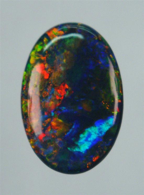 Appraisal: LOOSE BLACK AUSTRALIAN OPAL the oval shaped opal measuring x