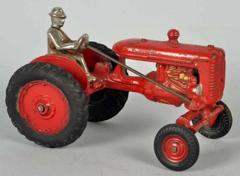 Appraisal: Cast Iron Arcade Tractor Toy American Off-set variation with black