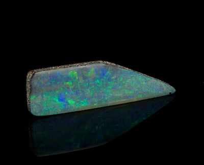 Appraisal: An Unmounted Boulder Opal Fragment Of elongated form black opal