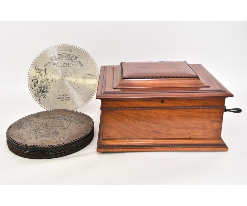 Appraisal: Regina table top mahogany music box S together with discs