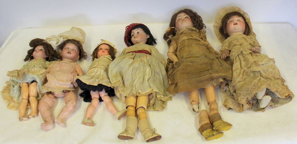 Appraisal: Antique Bisque Head German Dolls To include one headless Germany