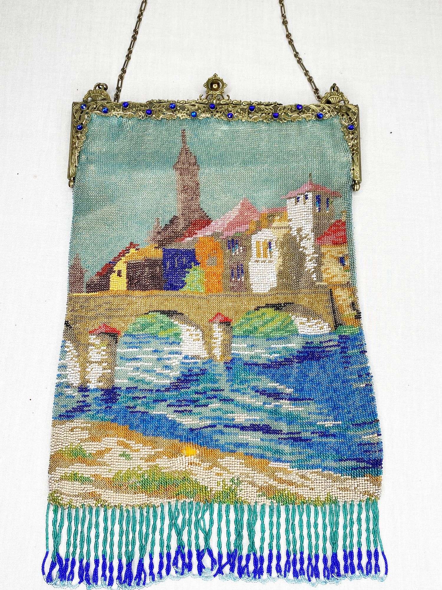 Appraisal: Micro Beaded Hand Bag with Bridge Scene and Jeweled Frame