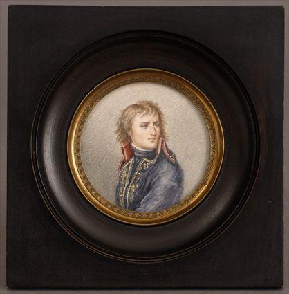 Appraisal: FRENCH MINIATURE PORTRAIT RONDEL THE YOUNG NAPOLEON Watercolor shell-chased brass