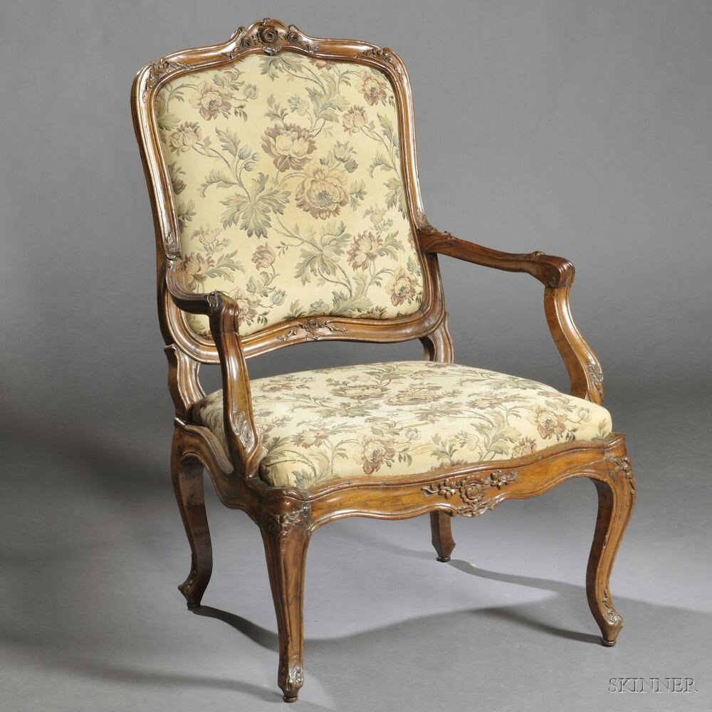 Appraisal: Louis XV-style Walnut Fauteuil late th early th century cartouche-shaped