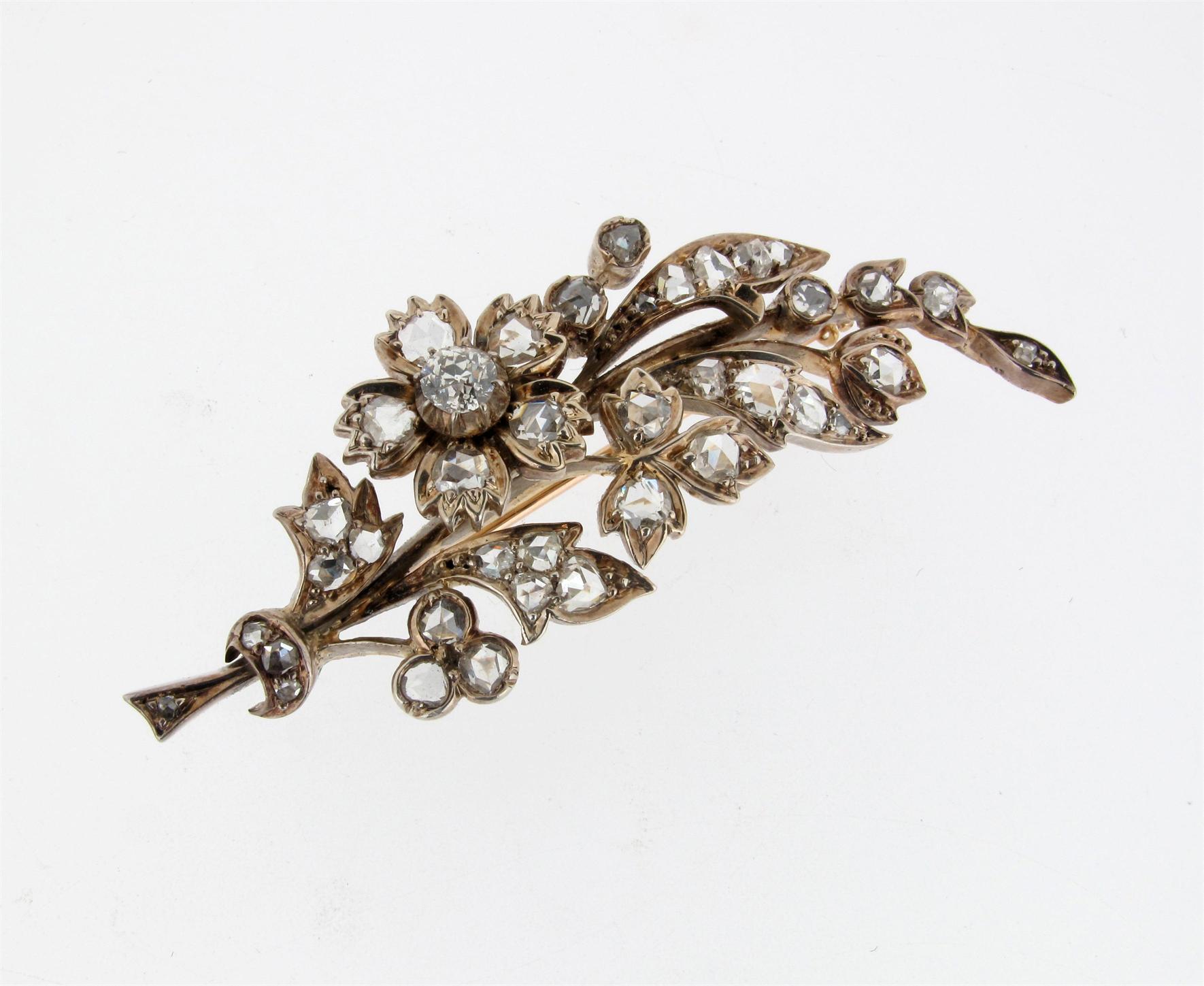 Appraisal: A Victorian diamond set spray brooch set in silver and