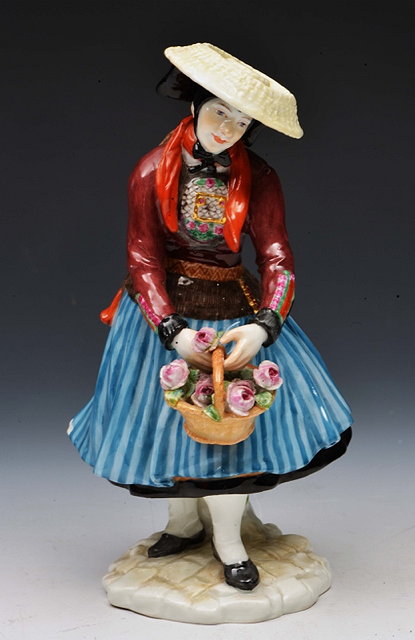 Appraisal: A MEISSEN PORCELAIN FIGURE of a girl with straw bonnet