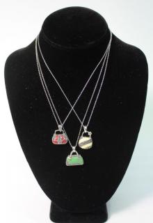 Appraisal: Sterling Marcasite Enamel Necklaces The pendants in the shape of