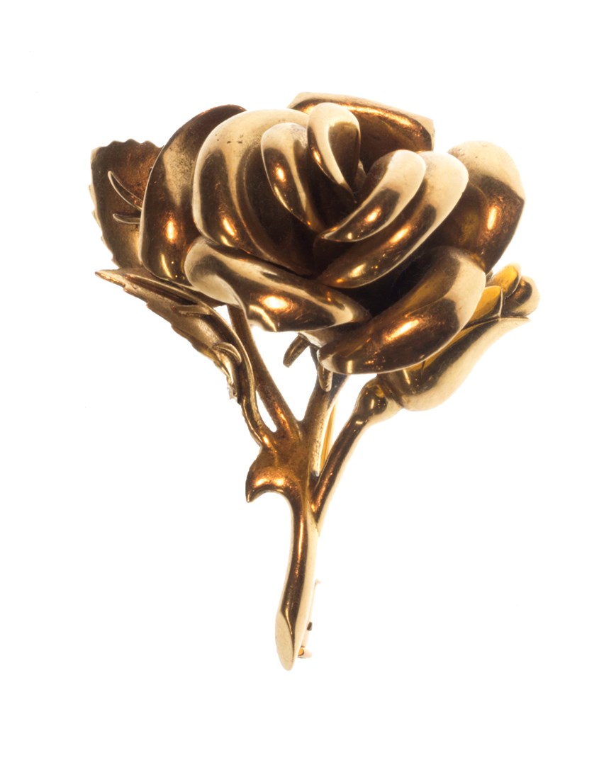 Appraisal: A French gold brooch designed as a flower spray detailed