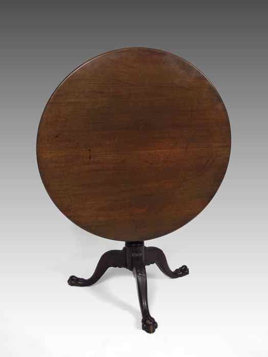 Appraisal: CHIPPENDALE STYLE TILT TOP TABLE Round walnut table candle platform