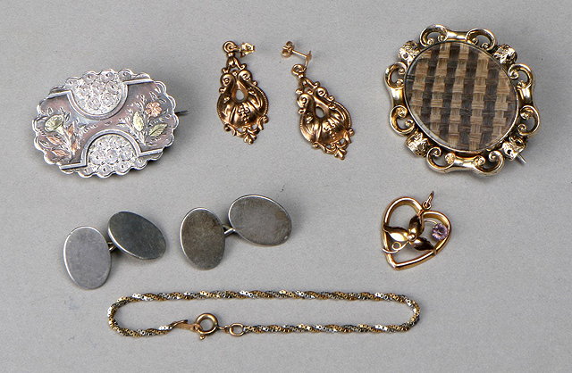 Appraisal: A COLLECTION TO INCLUDE a Victorian silver brooch with overlaid