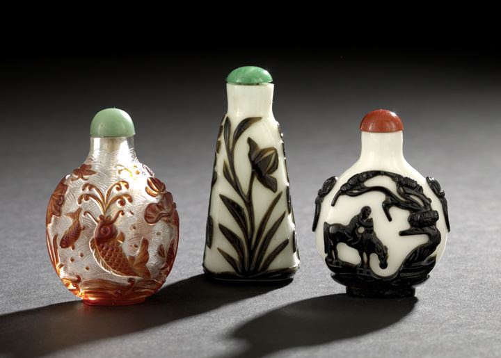 Appraisal: Group of Three Chinese Overlay Glass Snuff Bottles composed of