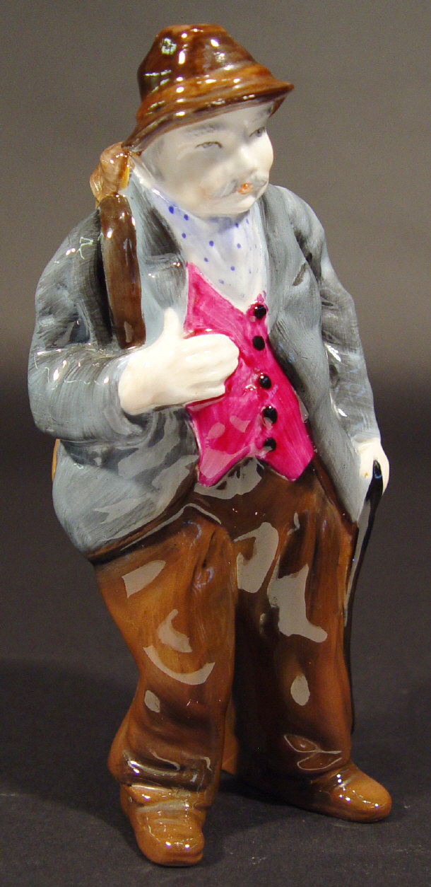 Appraisal: Coalport figure of an elderly gentleman with hand painted decoration