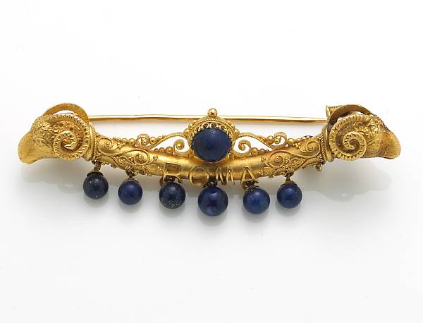 Appraisal: A lapis lazuli and eighteen karat gold ROMA double ram's