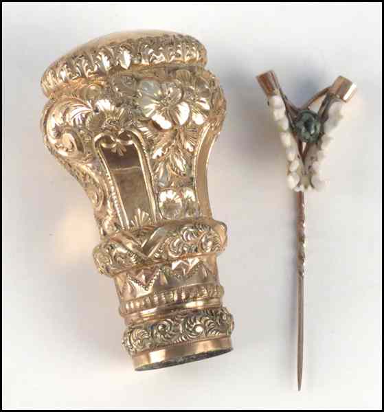 Appraisal: VICTORIAN GOLDFILLED CANE HANDLE Together with a stick pin Condition